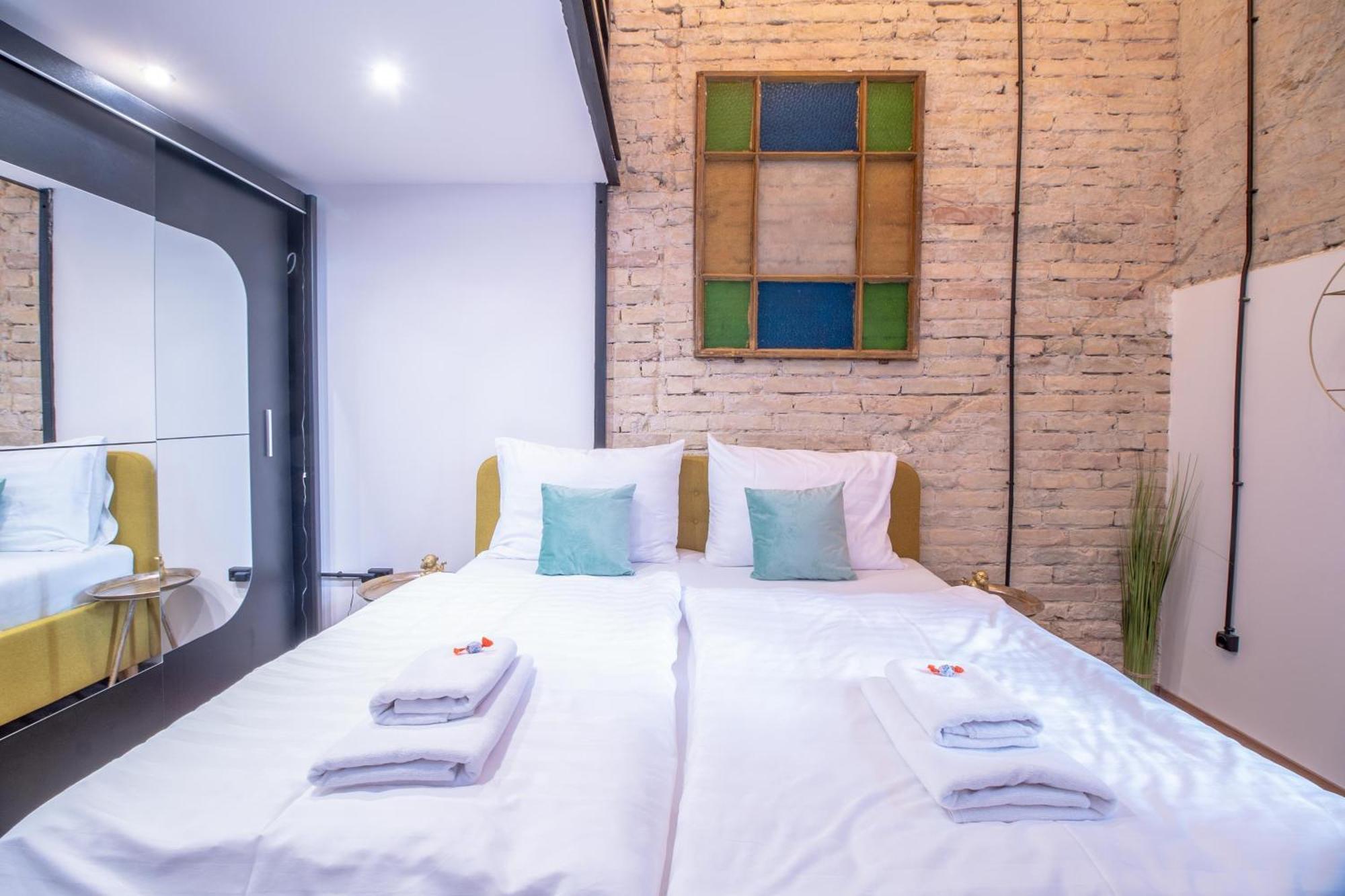 Corvin Loft Апартаменти *
